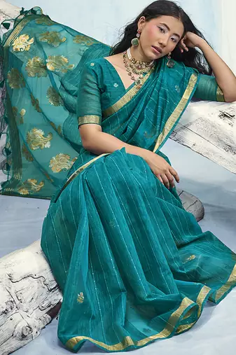 Teal blue linen silk blend saree with gold zari border & floral woven pallu