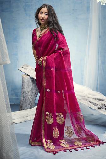 Rani pink linen silk blend saree with gold zari border & floral woven pallu