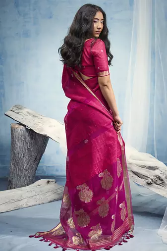 Rani pink linen silk blend saree with gold zari border & floral woven pallu