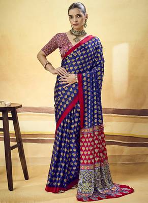 Navy blue satin printed saree with orange border and unstiched blouse 1
