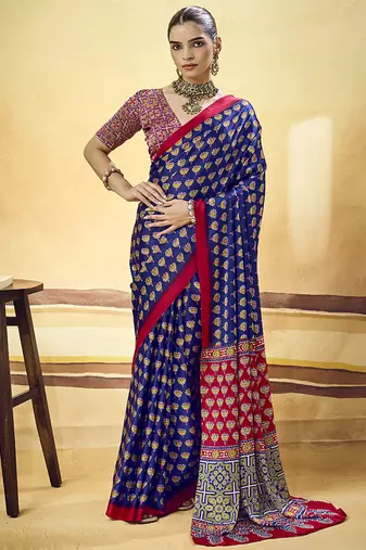 Navy blue satin printed saree with orange border and unstiched blouse