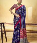 Navy blue satin printed saree with orange border and unstiched blouse