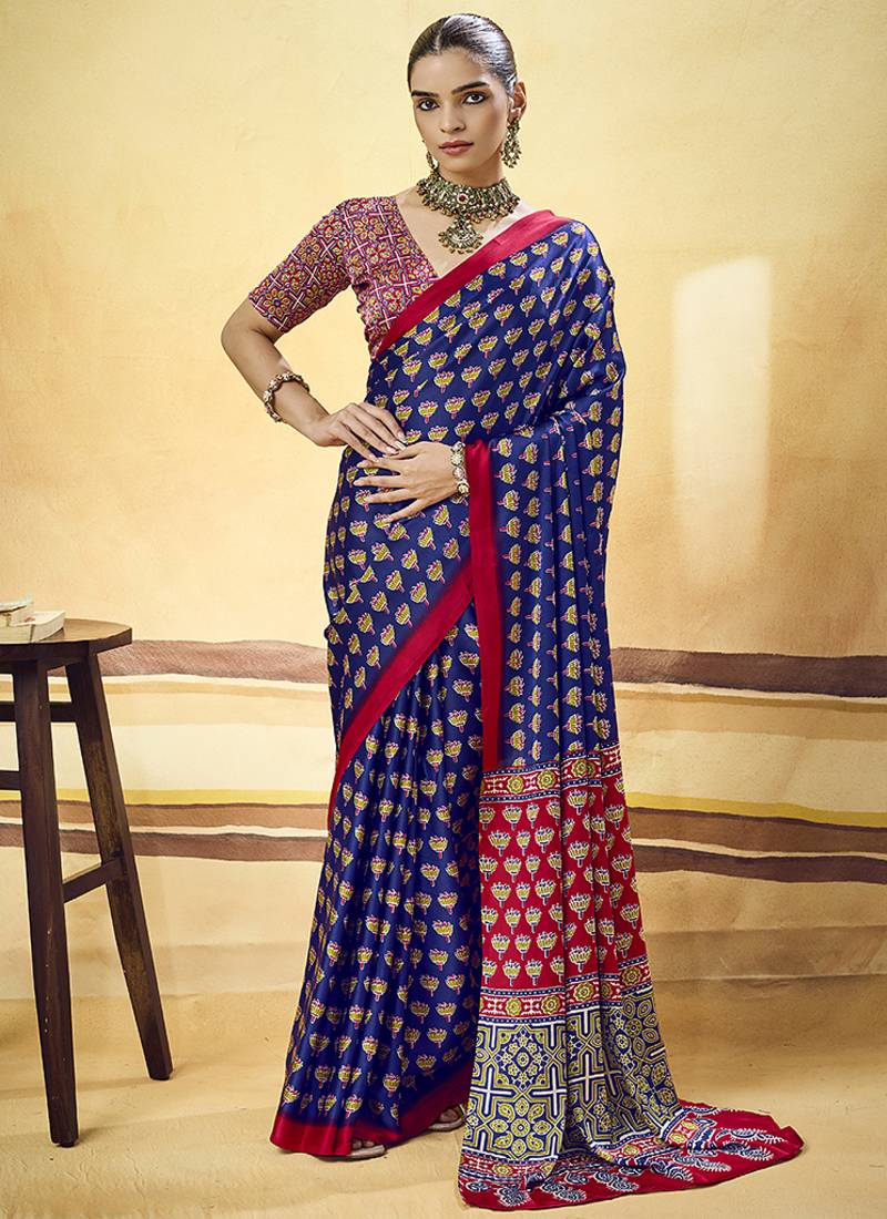 Navy blue satin printed saree with orange border and unstiched blouse