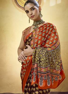 Brown satin printed saree with orange border and unstiched blouse 2