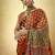Brown satin printed saree with orange border and unstiched blouse