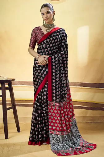 Black satin printed saree with orange border and unstiched blouse