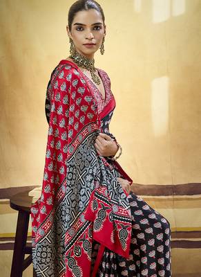 Black satin printed saree with orange border and unstiched blouse 2