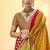 Mustard satin printed saree with orange border and unstiched blouse