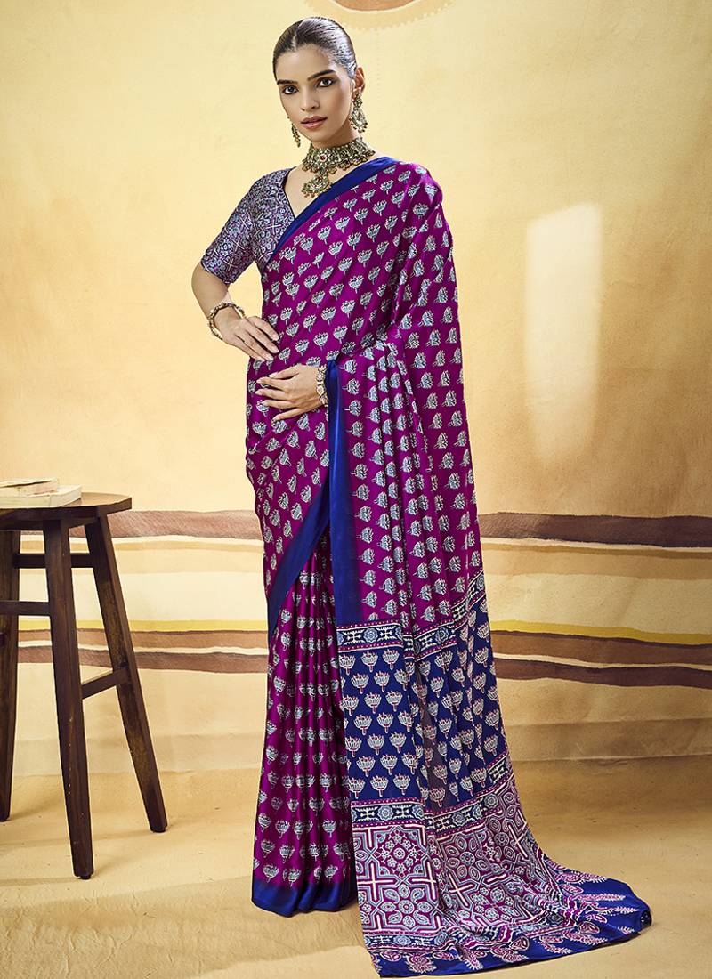 Magenta satin printed saree with orange border and unstiched blouse