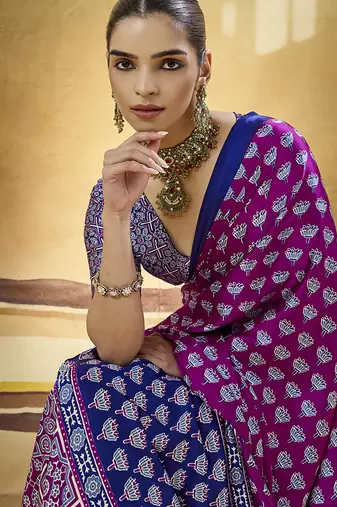 Magenta satin printed saree with orange border and unstiched blouse