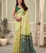 Light yellow linen blend saree with woven elephant & geometric pallu