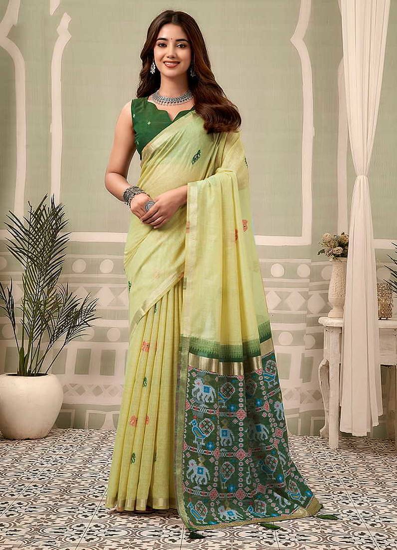 Light yellow linen blend saree with woven elephant & geometric pallu