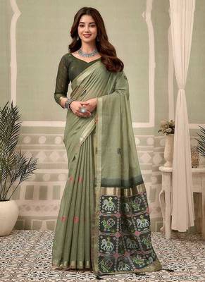 Sage green linen blend saree with woven elephant & geometric pallu 1