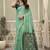 Sea green linen blend saree with woven elephant & geometric pallu