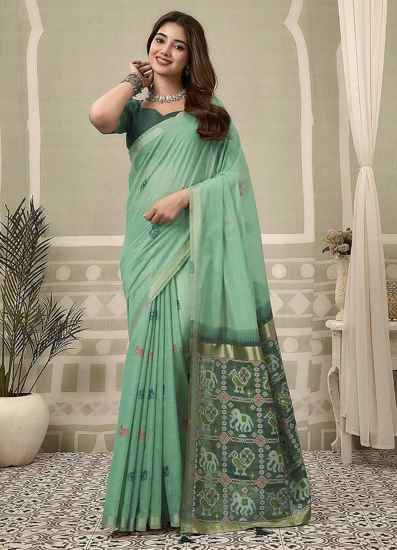 Sea green linen blend saree with woven elephant & geometric pallu