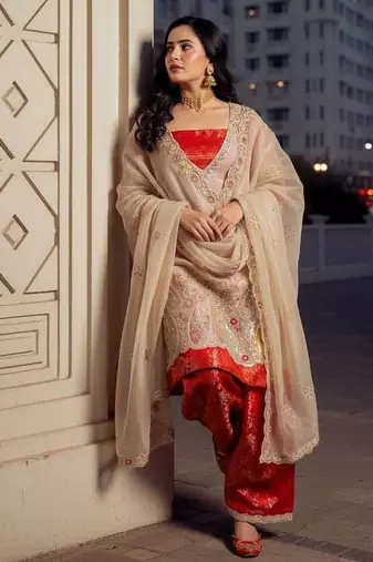 Orange pure tissue embroidered kurti palazzo set with dupatta