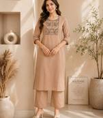 Women's new stylish trendy cream cotton silk embroidery work straight kurti with trousers