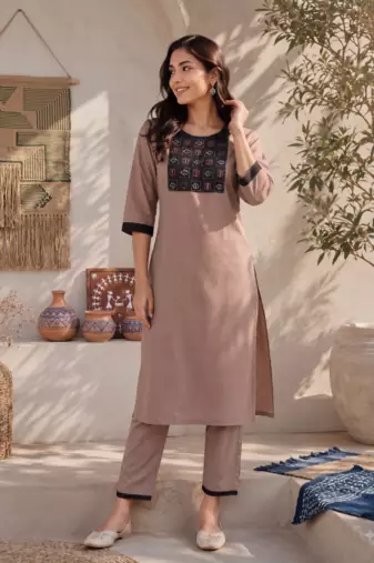 Women's new stylish brown  cotton blend straight kurta with pants and embroidered yoke