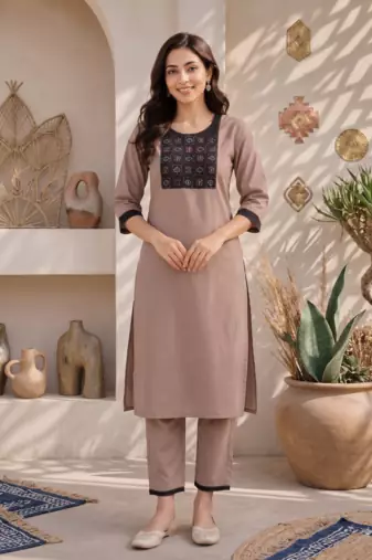 Women's new stylish brown  cotton blend straight kurta with pants and embroidered yoke