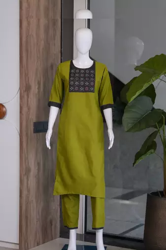 Women's new stylish green  cotton blend straight kurta with pants and embroidered yoke