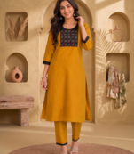 Women's new stylish mustard  cotton blend straight kurta with pants and embroidered yoke
