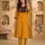 Women's new stylish mustard  cotton blend straight kurta with pants and embroidered yoke