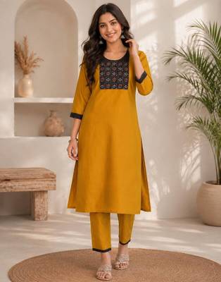 Women's new stylish mustard  cotton blend straight kurta with pants and embroidered yoke 1