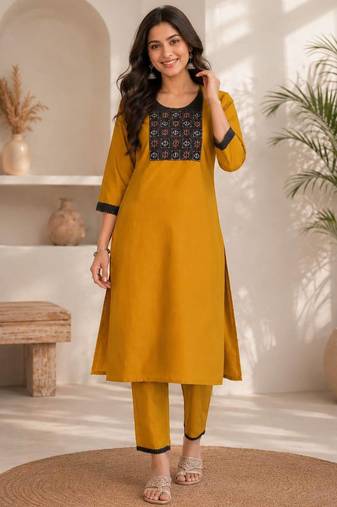 Women's new stylish mustard  cotton blend straight kurta with pants and embroidered yoke