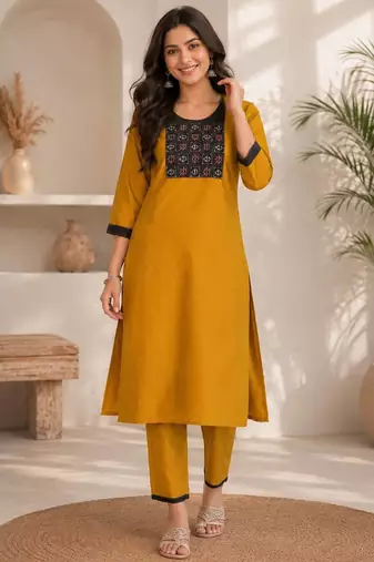 Women's new stylish mustard  cotton blend straight kurta with pants and embroidered yoke