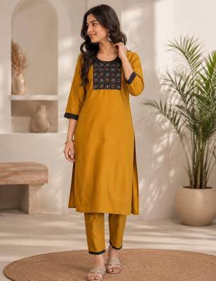 Women's new stylish mustard  cotton blend straight kurta with pants and embroidered yoke 3