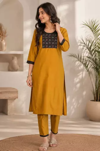 Women's new stylish mustard  cotton blend straight kurta with pants and embroidered yoke