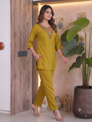 Women new mustard solid kurta pant set with heavy neck embroidery 2