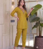 Women new mustard solid kurta pant set with heavy neck embroidery