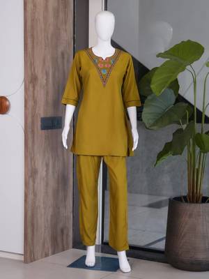 Women new mustard solid kurta pant set with heavy neck embroidery 4