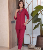 Women new rani pink solid kurta pant set with heavy neck embroidery