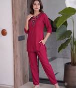 Women new rani pink solid kurta pant set with heavy neck embroidery