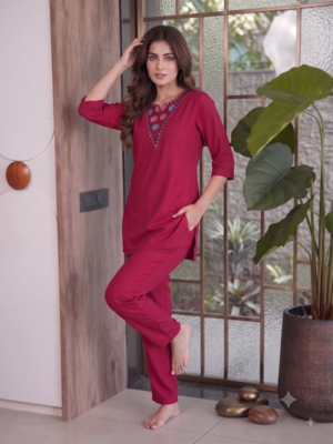 Women new rani pink solid kurta pant set with heavy neck embroidery 3