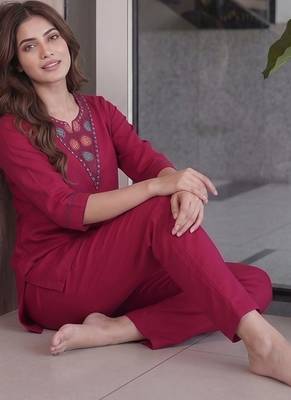 Women new rani pink solid kurta pant set with heavy neck embroidery 3