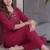 Women new rani pink solid kurta pant set with heavy neck embroidery