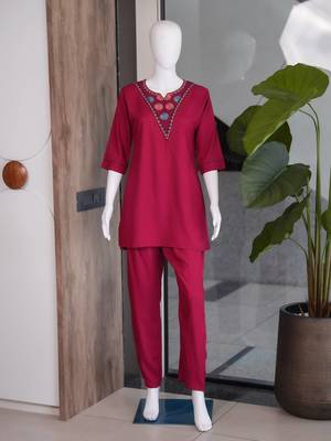 Women new rani pink solid kurta pant set with heavy neck embroidery 4