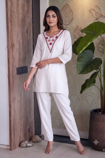 Women new white solid kurta pant set with heavy neck embroidery