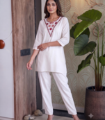 Women new white solid kurta pant set with heavy neck embroidery
