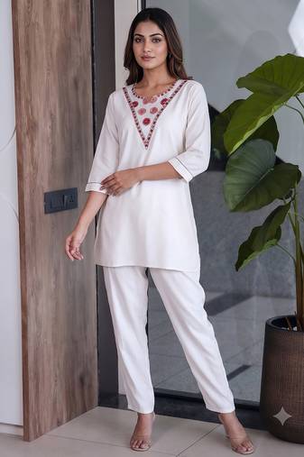 Women new white solid kurta pant set with heavy neck embroidery