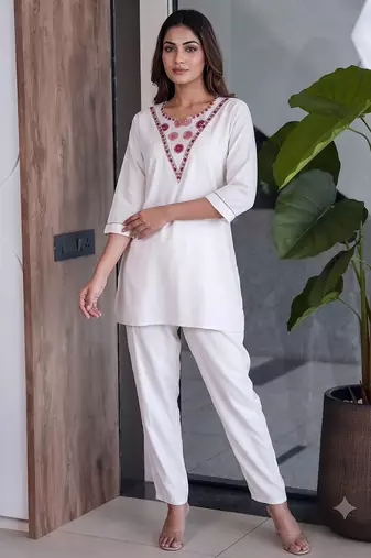 Women new white solid kurta pant set with heavy neck embroidery