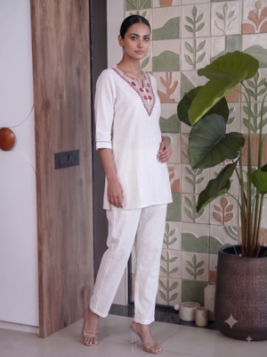 Women new white solid kurta pant set with heavy neck embroidery 2