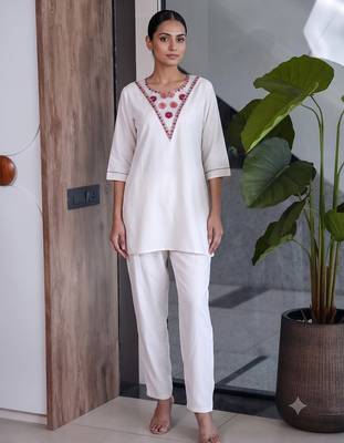 Women new white solid kurta pant set with heavy neck embroidery 3