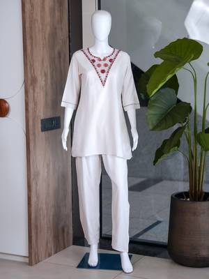 Women new white solid kurta pant set with heavy neck embroidery 4
