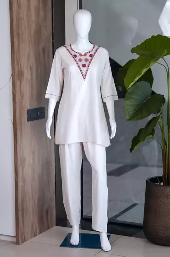 Women new white solid kurta pant set with heavy neck embroidery