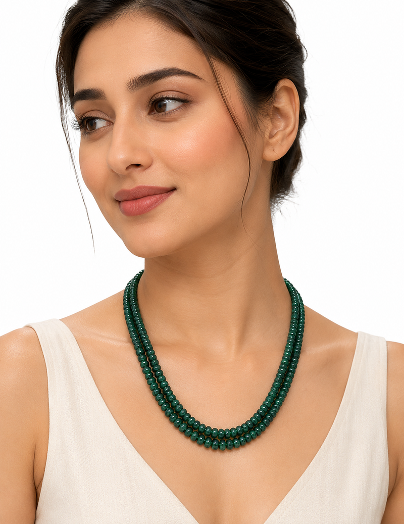 2 rows precious uncut emeralds