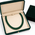 2 rows precious uncut emeralds